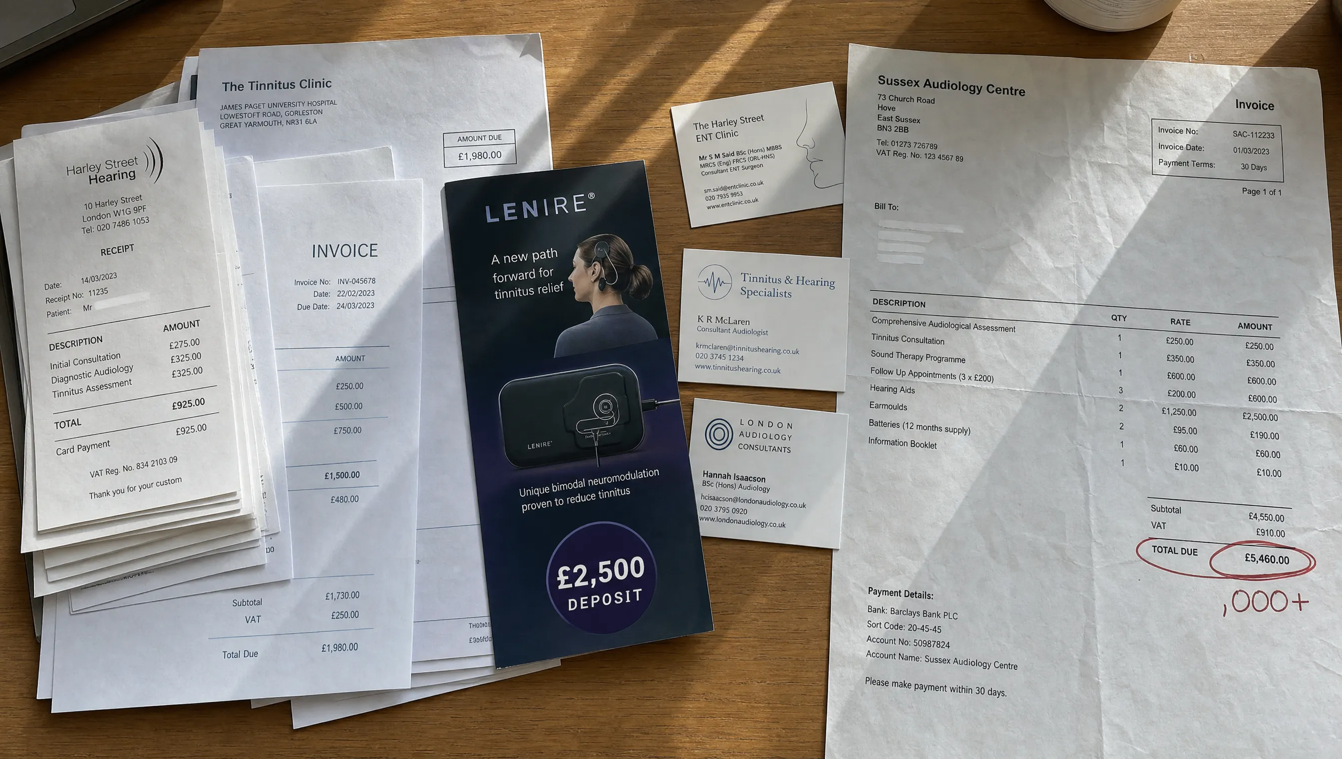 Stack of medical bills, Lenire brochure with $4,500 deposit, specialist business cards